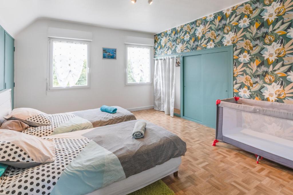 Postel nebo postele na pokoji v ubytování Gîte des Gardiens de Phare