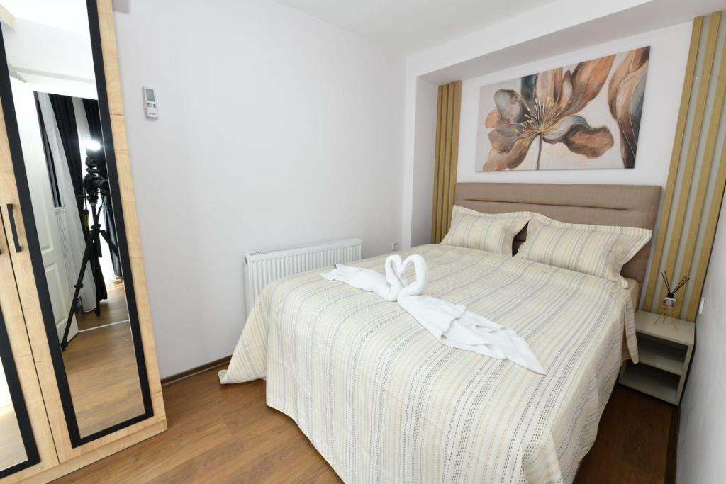 Postel nebo postele na pokoji v ubytování Sea Moon Hotel
