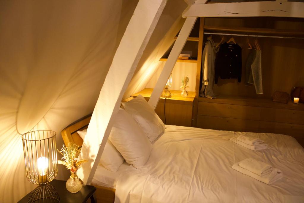 En eller flere senge i et værelse på Maison familiale et cosy à la mer