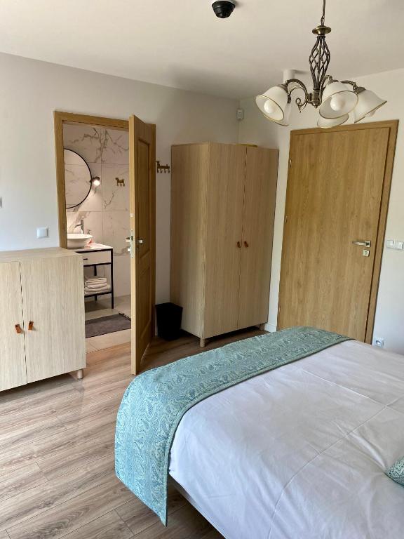 Postel nebo postele na pokoji v ubytování Stara Plebania