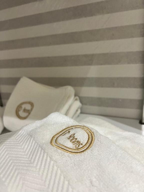 Postel nebo postele na pokoji v ubytování Enzo rooms & apartment Blloku