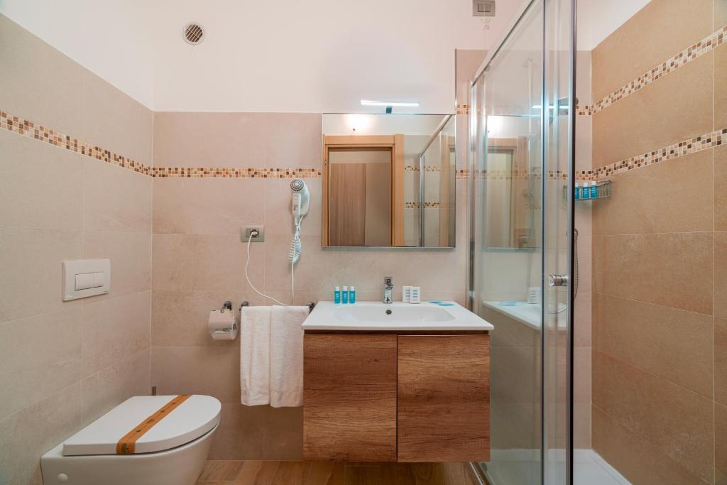 Een badkamer bij Hotel Portoconte