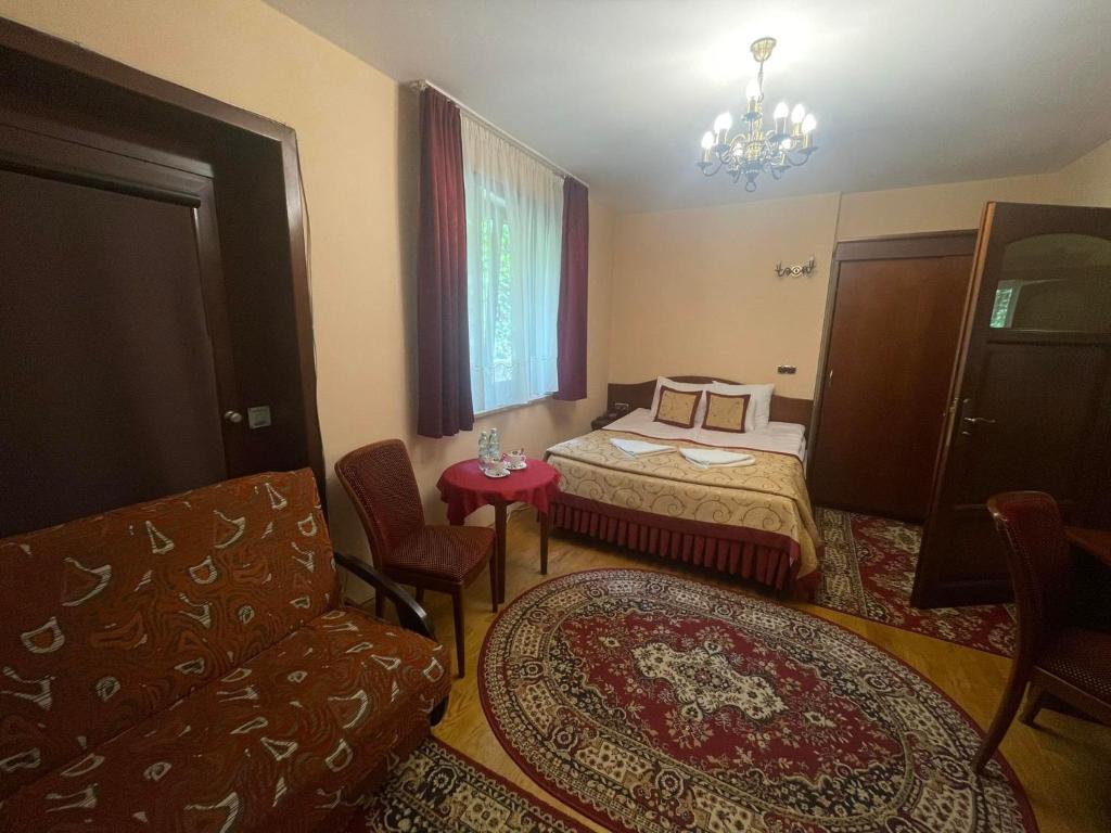 Posteľ alebo postele v izbe v ubytovaní Pensjonat Szach