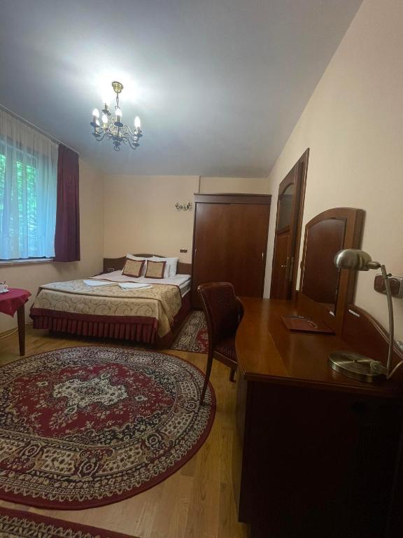 Posteľ alebo postele v izbe v ubytovaní Pensjonat Szach