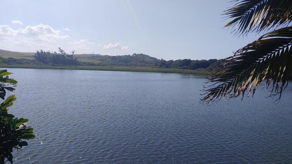 a view of a body of water with trees at THE BOAT HOUSE, 53 Nkwazi Drive in Zinkwazi Beach