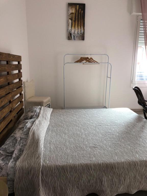 Postel nebo postele na pokoji v ubytování R&B MiDora Modena