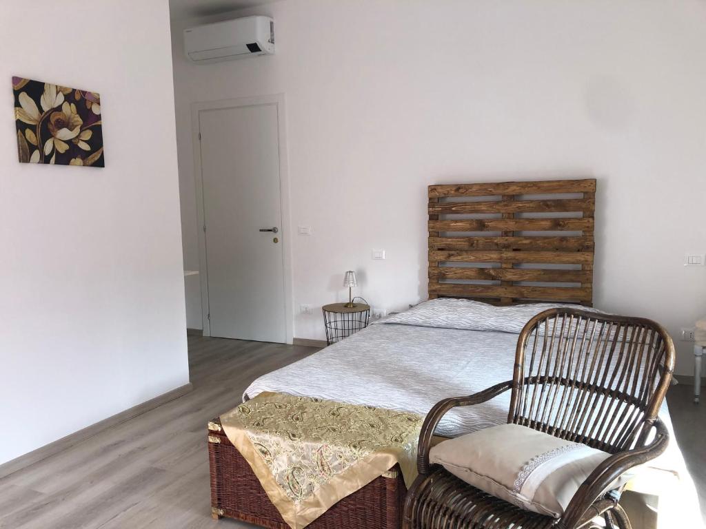 Postel nebo postele na pokoji v ubytování R&B MiDora Modena