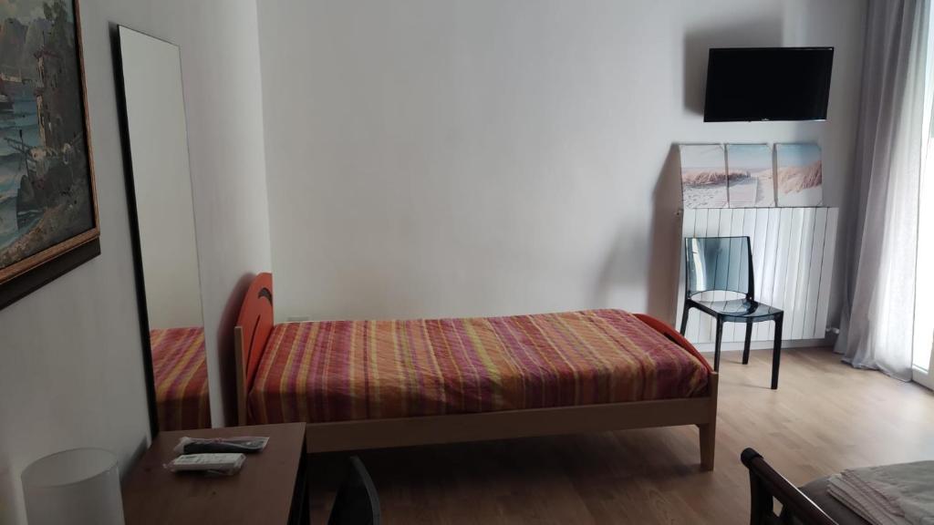 Postel nebo postele na pokoji v ubytování Dimora Rudiae Lecce