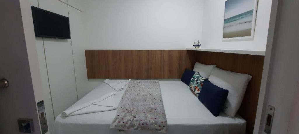 Postel nebo postele na pokoji v ubytování Pipa Ubaia 219 com solarium