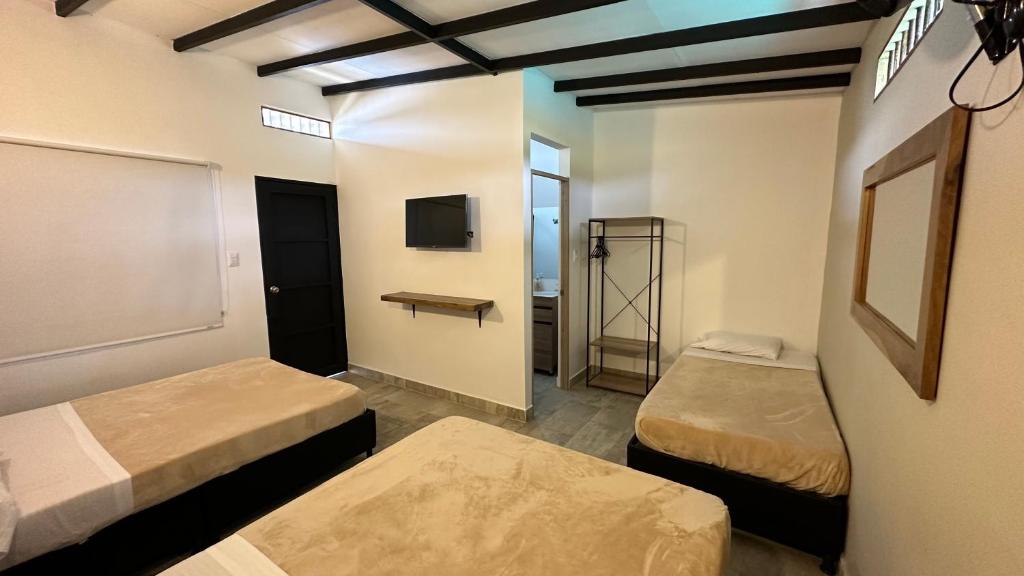 Una cama o camas en una habitación de Baum Hotel