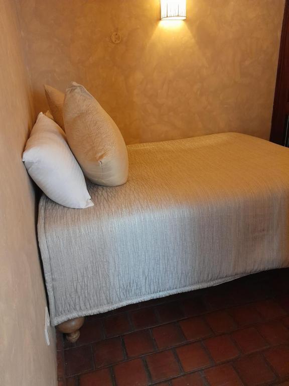 Postel nebo postele na pokoji v ubytování Woodmere Grand Hotel & Serviced Apartments