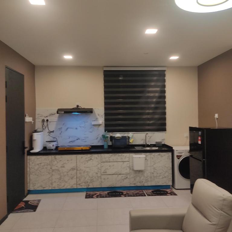 Köök või kööginurk majutusasutuses Urban Suites JSW GEORGETOWN PENANG, MALAYSIA