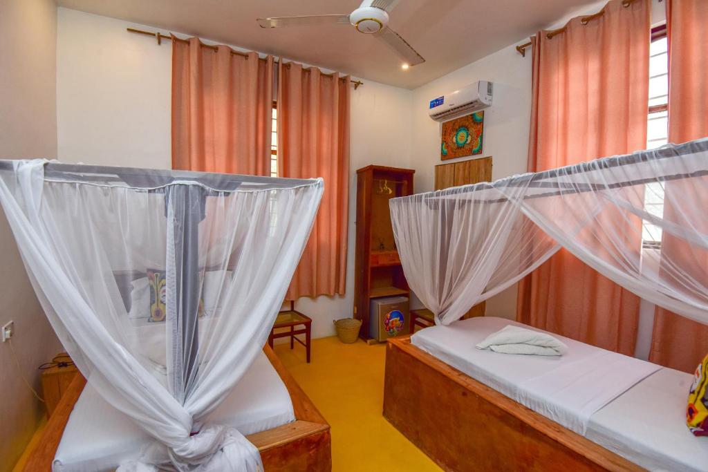 Postel nebo postele na pokoji v ubytování Barabara house