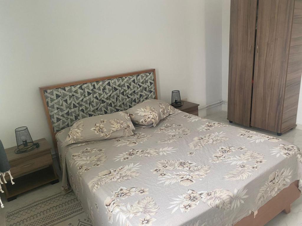 Postel nebo postele na pokoji v ubytování NN Residence Tabarka
