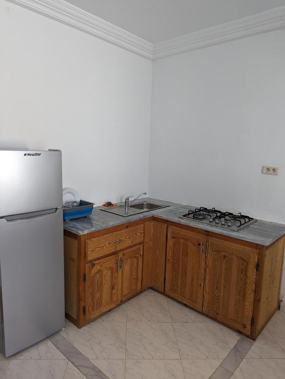 Kuchyň nebo kuchyňský kout v ubytování NN Residence Tabarka