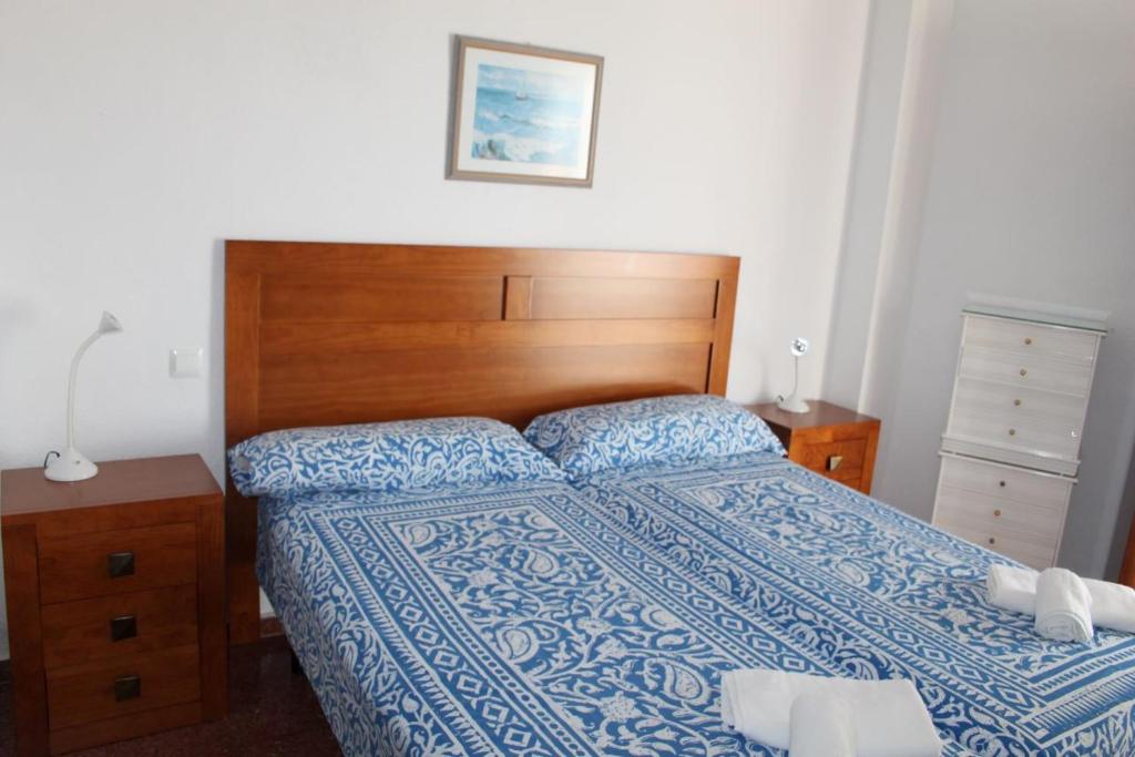 Postel nebo postele na pokoji v ubytování Torresol406