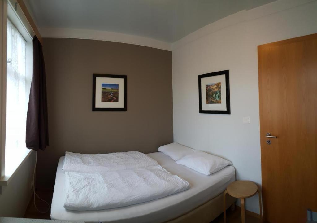 Postel nebo postele na pokoji v ubytování Guesthouse Aurora
