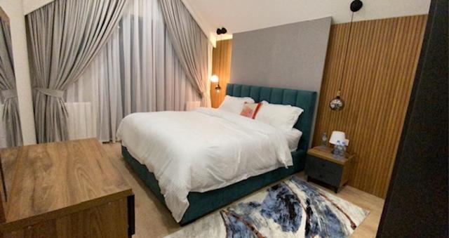 Кровать или кровати в номере Duplex in four seasons new gudauri near gondola