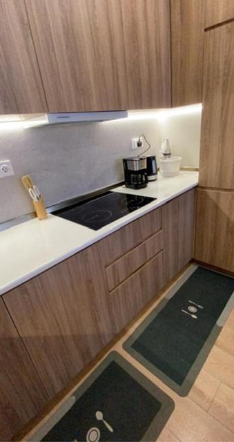 Кухня или мини-кухня в Duplex in four seasons new gudauri near gondola
