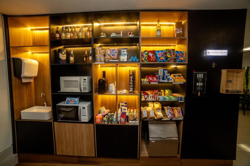 A cozinha ou cozinha compacta de Nobile Inn Pampulha