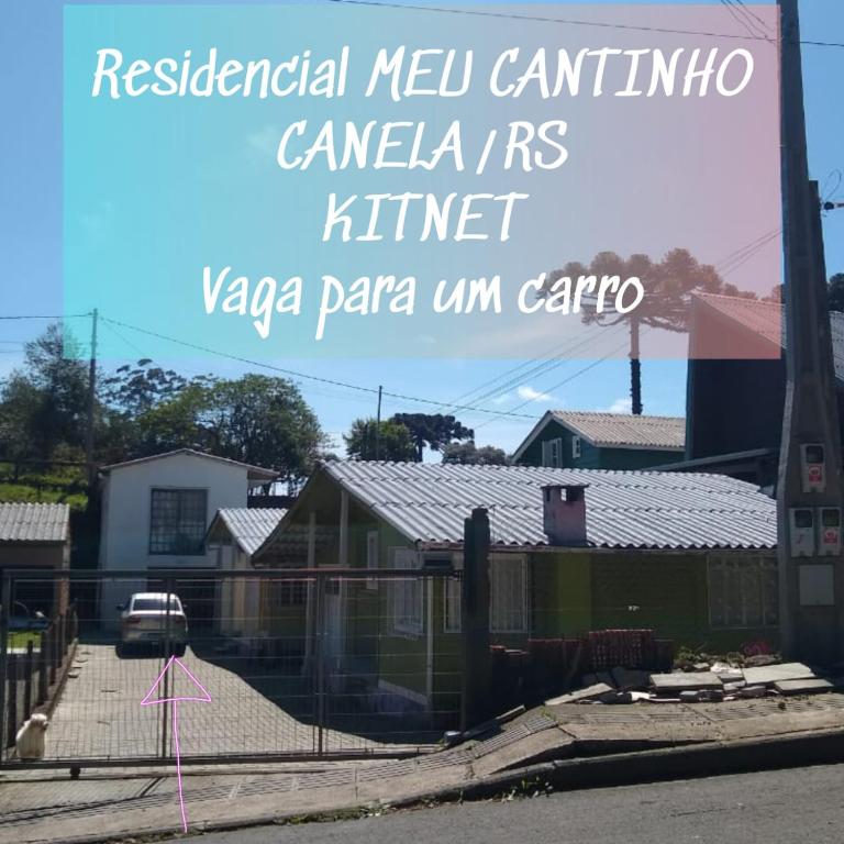 Znak, który czyta mieszkaniową meksykańską kuchnię cantina camans i aza w obiekcie RESIDENCIAL MEU CANTINHO w mieście Canela