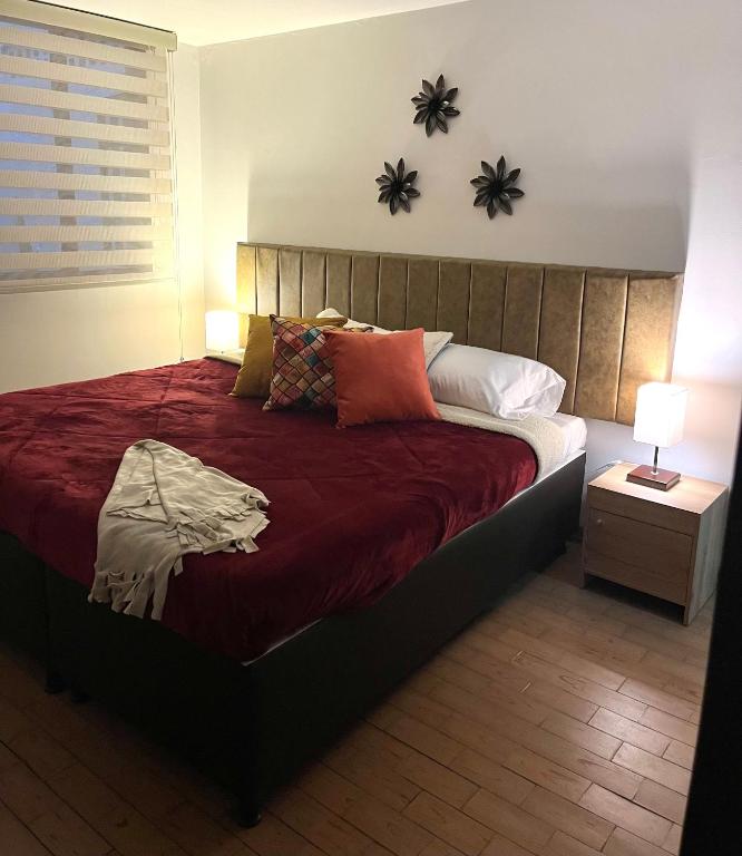 Postel nebo postele na pokoji v ubytování HOSTAL SEP7IMO ARTE