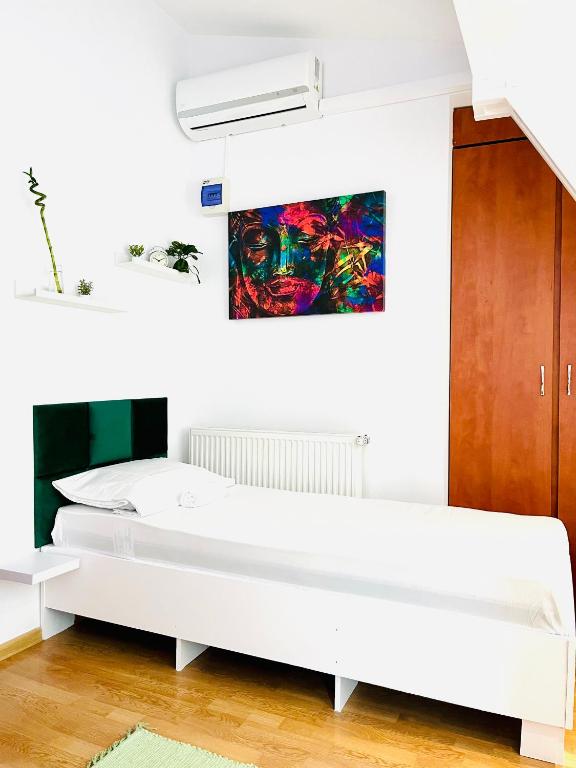 Postel nebo postele na pokoji v ubytování Cozy Hideout - Condo Hotel