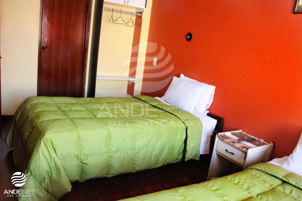 Postel nebo postele na pokoji v ubytování ANDENES DEL TITICACA