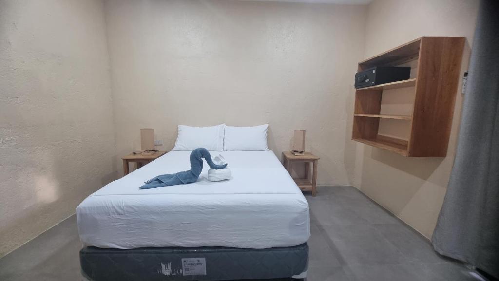 Postel nebo postele na pokoji v ubytování Tiki Bantayan Cebu Tourist Inn Inc