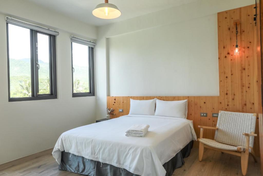 Postel nebo postele na pokoji v ubytování Mountains Inn