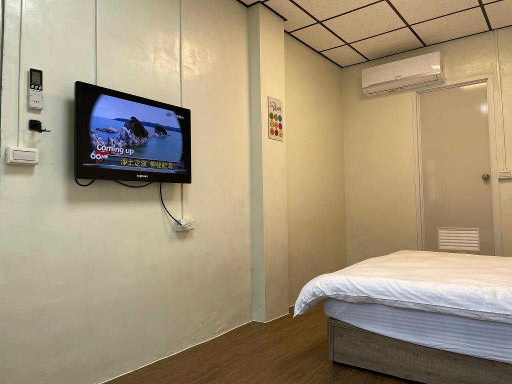 TV a/nebo společenská místnost v ubytování 佳林居