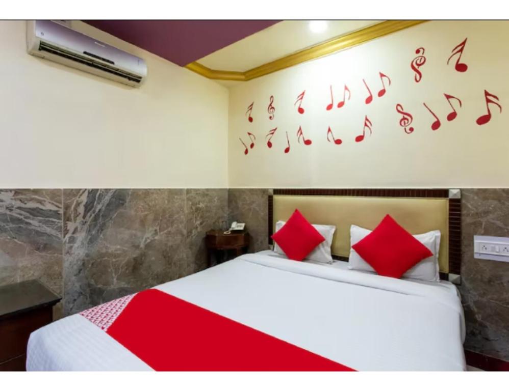Posteľ alebo postele v izbe v ubytovaní Shreenath Palace, Ujjain