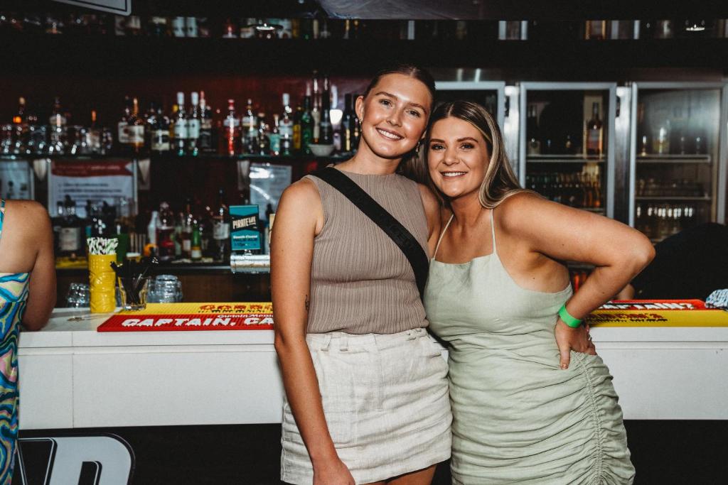 a man and woman standing in front of a bar at Ceduna Foreshore Hotel Motel in Ceduna