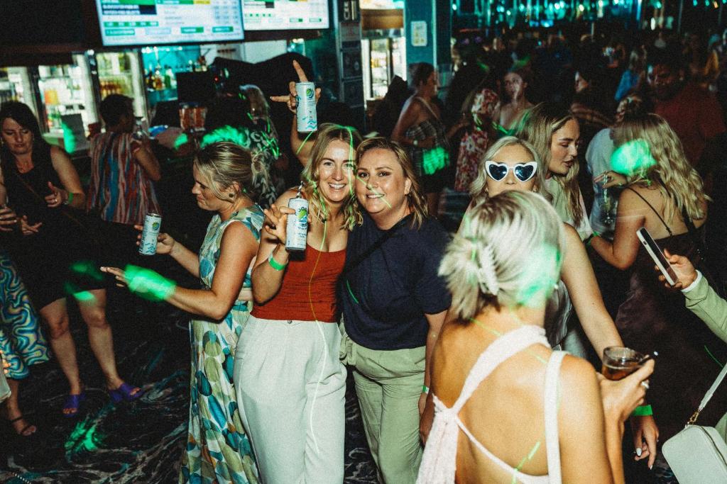 a group of women standing in a crowd at a party at Ceduna Foreshore Hotel Motel in Ceduna