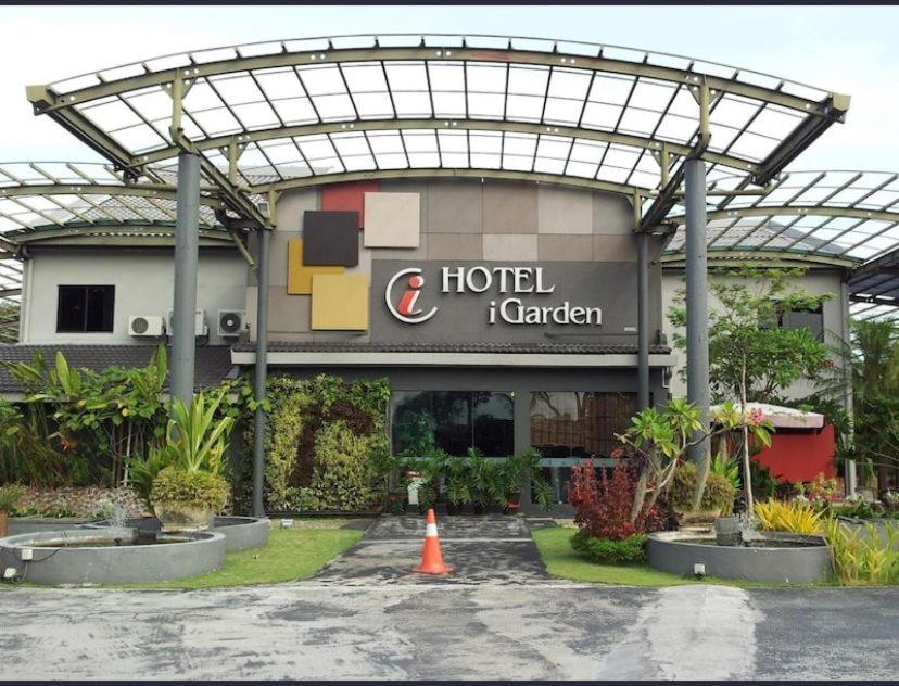 a hotel canadian building with an orange cone in front of it at I Garden Hotel in Ipoh