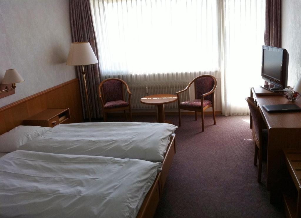 Postel nebo postele na pokoji v ubytování Fontana Budget