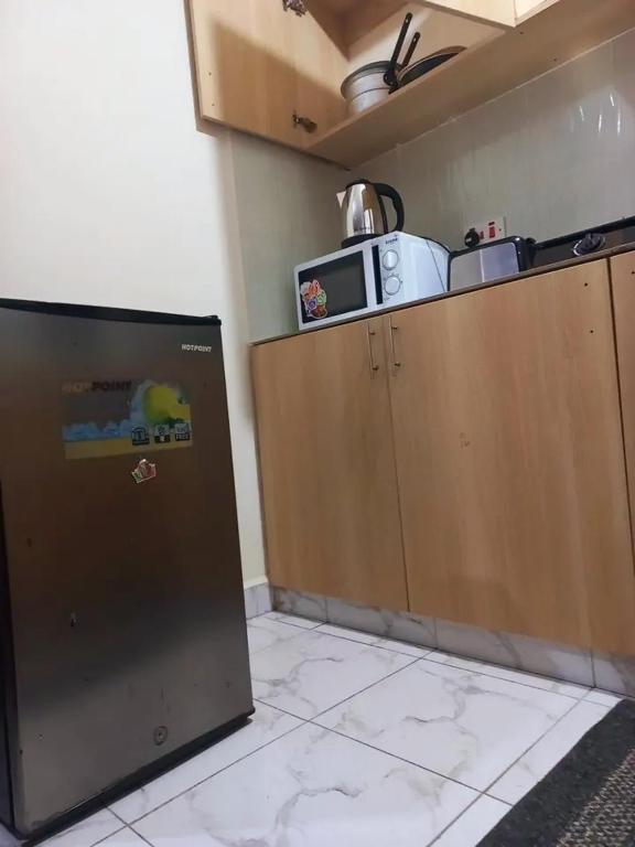 Kuchyň nebo kuchyňský kout v ubytování Mtwapa june apartment 3
