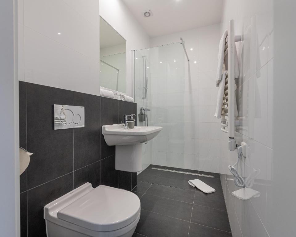 Koupelna v ubytování Hotel Rader