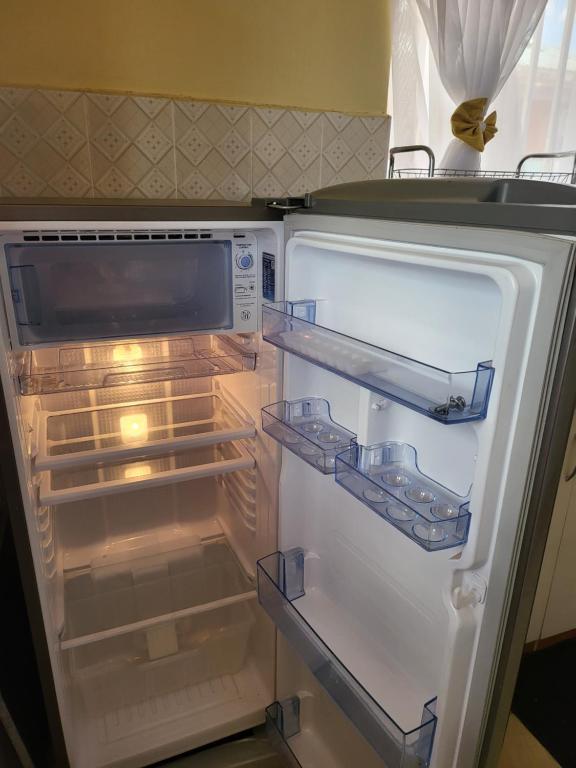 Kuchyň nebo kuchyňský kout v ubytování G&G Homes Eldoret