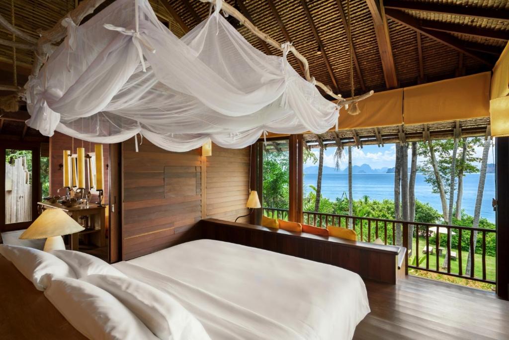 Postel nebo postele na pokoji v ubytování Six Senses Yao Noi