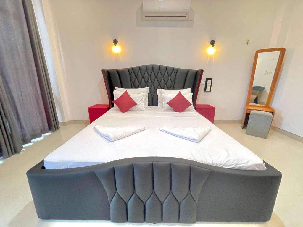Ένα ή περισσότερα κρεβάτια σε δωμάτιο στο ismattha hotel