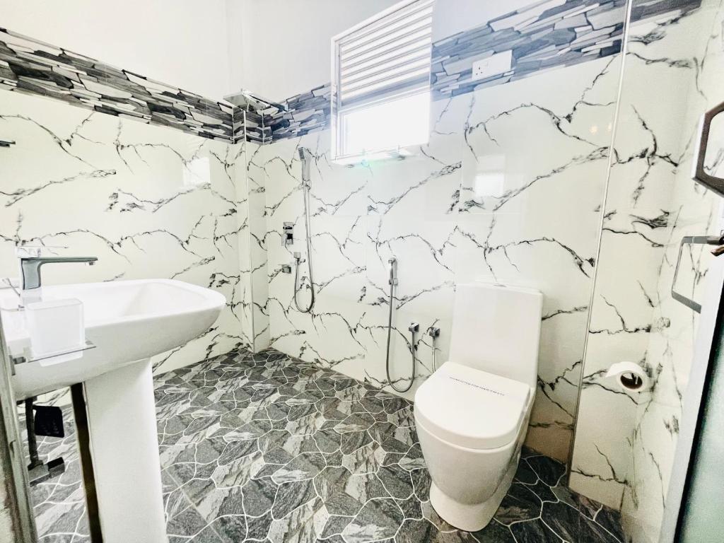 Koupelna v ubytování Ismattha Hotel