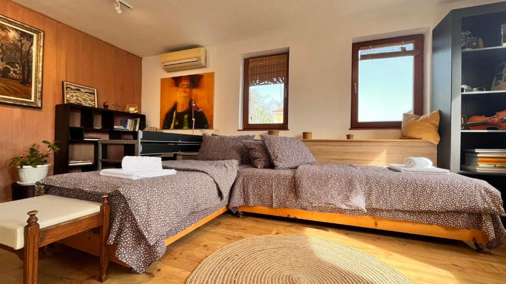 Postel nebo postele na pokoji v ubytování Atelier19