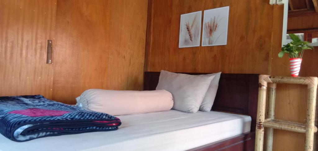 Postel nebo postele na pokoji v ubytování Radiya Guesthouse