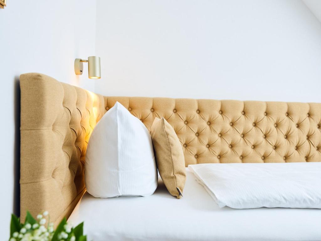 Postel nebo postele na pokoji v ubytování Hotel Lindenufer