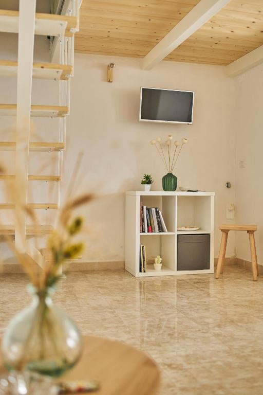 TV a/nebo společenská místnost v ubytování nonnanina
