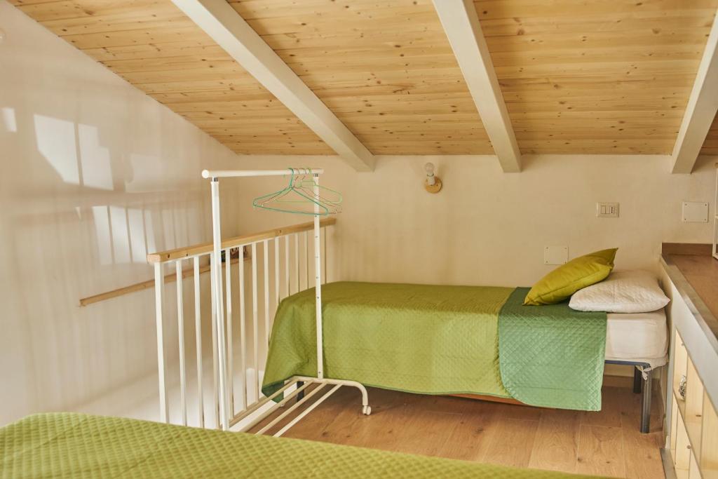 Postel nebo postele na pokoji v ubytování nonnanina