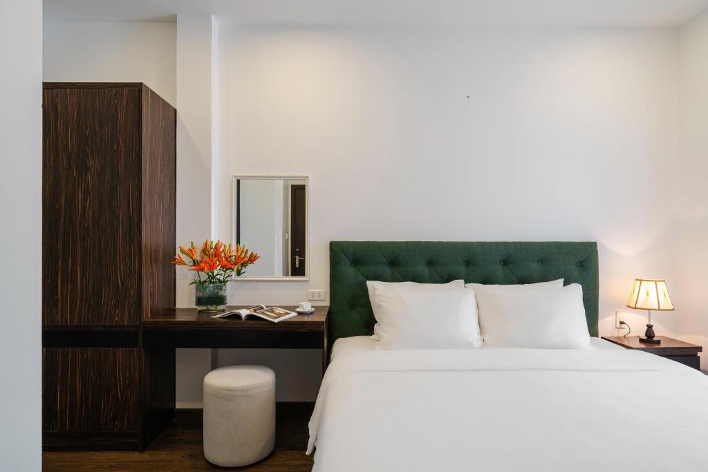 Postel nebo postele na pokoji v ubytování TTR Moonstone Apart Hotel