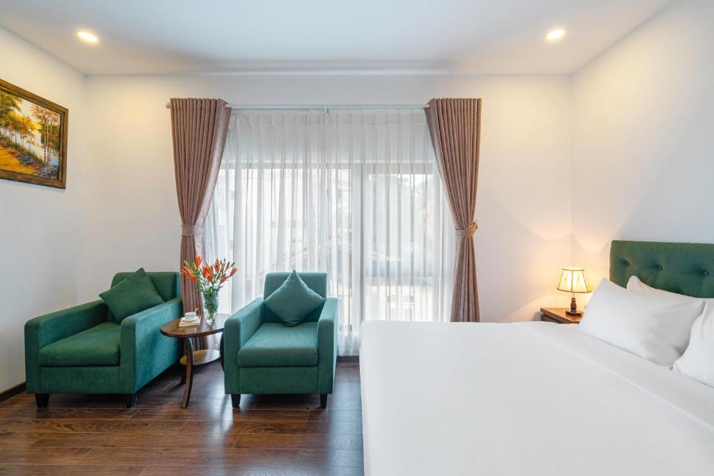 Postel nebo postele na pokoji v ubytování TTR Moonstone Apart Hotel