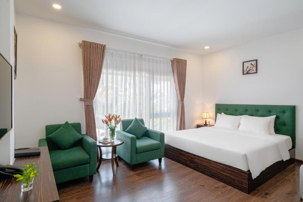 Postel nebo postele na pokoji v ubytování TTR Moonstone Apart Hotel